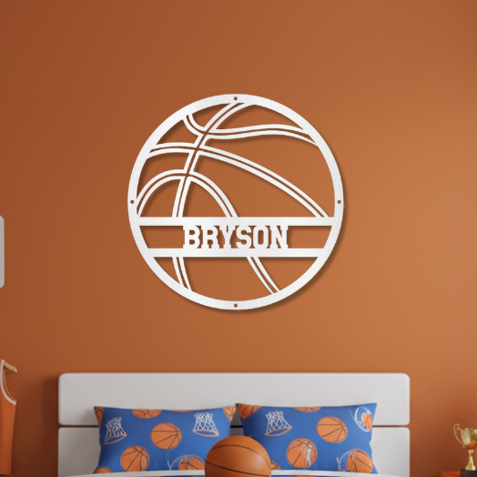 Children's bedroom with basketball-themed decor, including a bedspread and personalized basketball wall art.