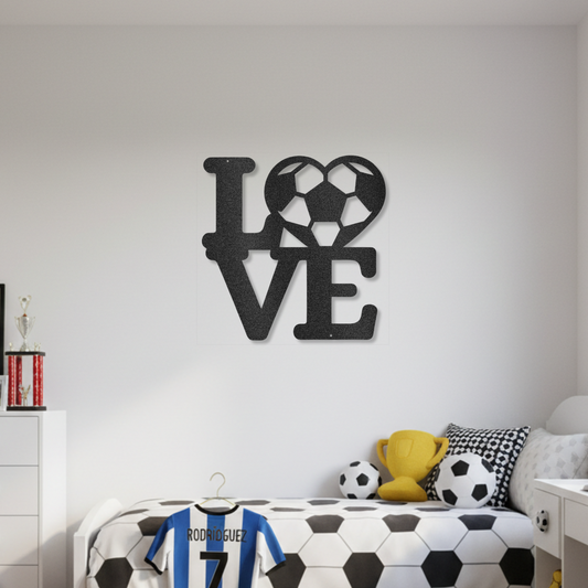 Black metal "LOVE" wall art with a soccer ball heart shaped "O" on a white wall in a child's bedroom