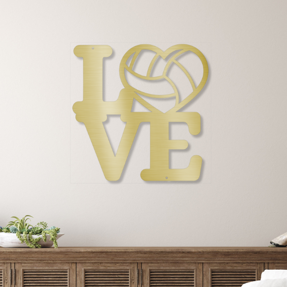 Living room with wooden furniture, white sofa, and gold colored volleyball metal "LOVE" wall art.